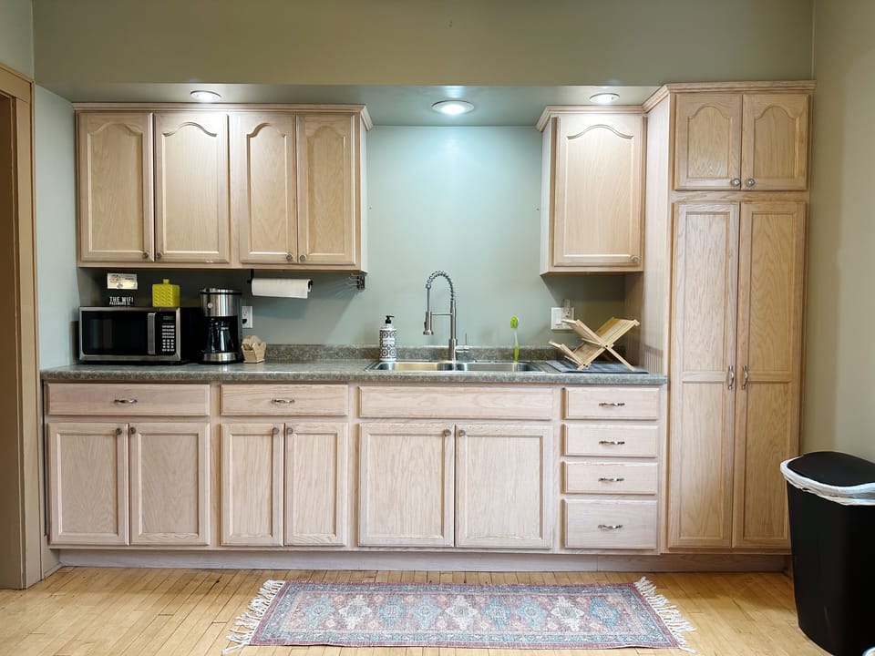 Cute, functional, and fully stocked kitchen. 
