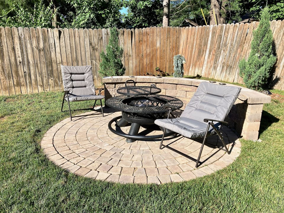 Fire pit in large fenced back yard (guests supply their own wood or charcoal)