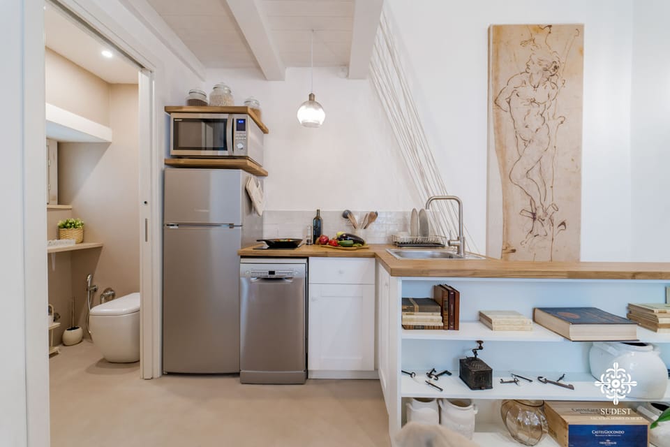 Exclusive Apartment | Private kitchen | Fridge, coffee/tea maker, highchair, dining tables