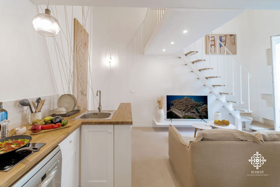 Exclusive Apartment | Private kitchen | Fridge, coffee/tea maker, highchair, dining tables