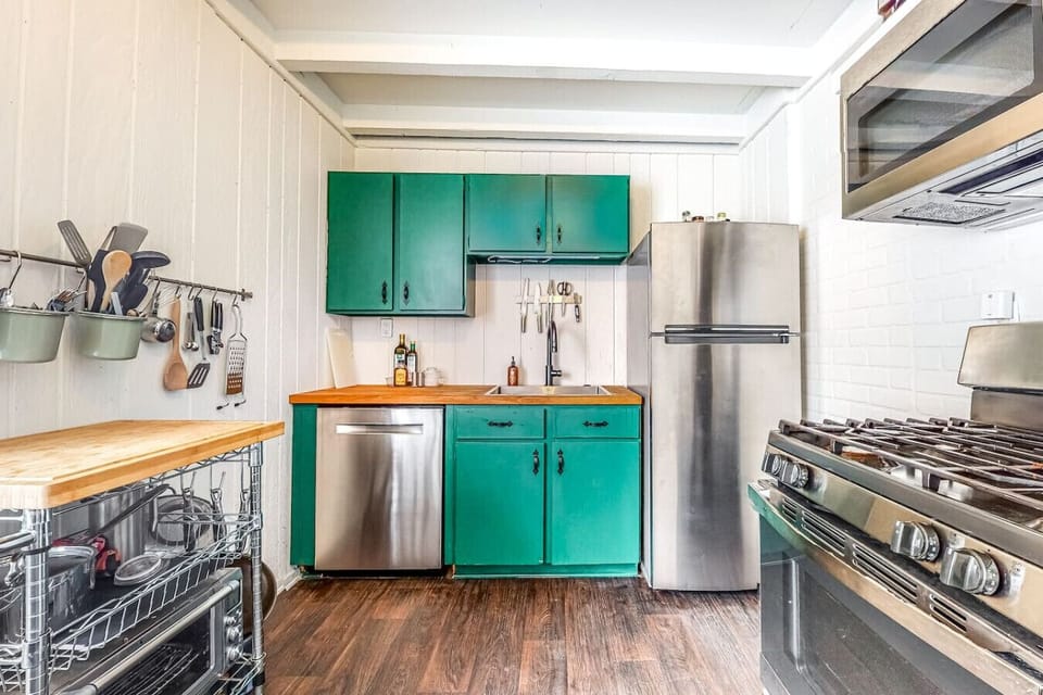 A fully equipped kitchen with everything you need to enjoy a break from the bustle of Main Street restaurants.