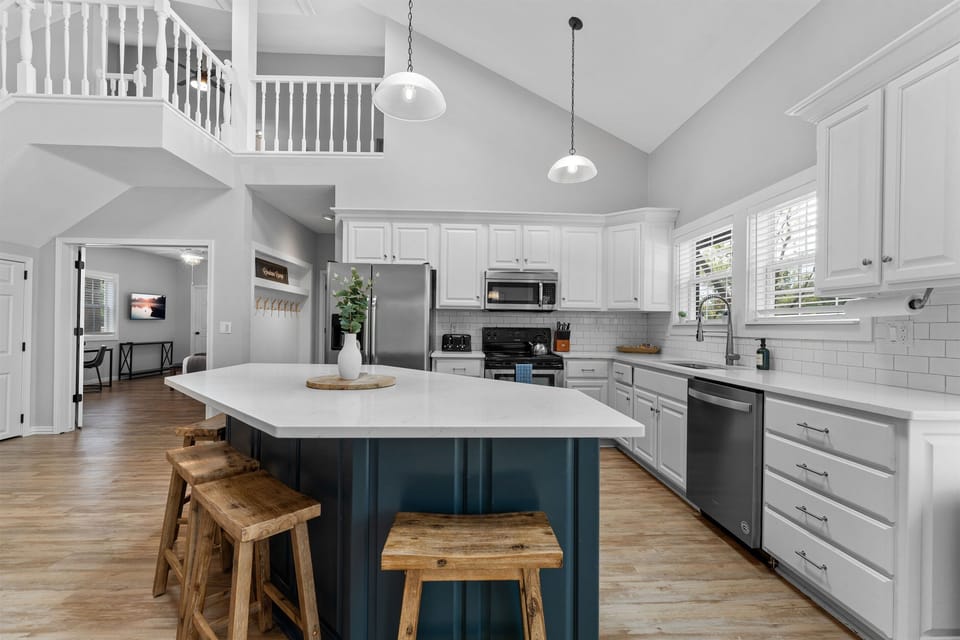 The kitchen is stocked with pots, pans and utensils to prepare big meals for your famliy gatherings