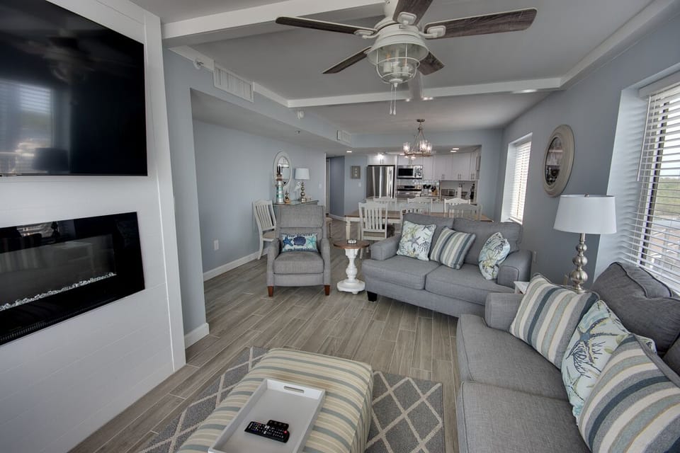 55" smart TV and electric fireplace for your enjoyment.