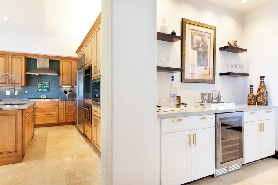 Let's head to the kitchen just off the entertainment bar