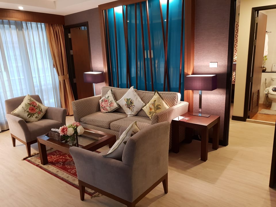 Suite, 1 Bedroom | Desk, blackout drapes, iron/ironing board, free WiFi