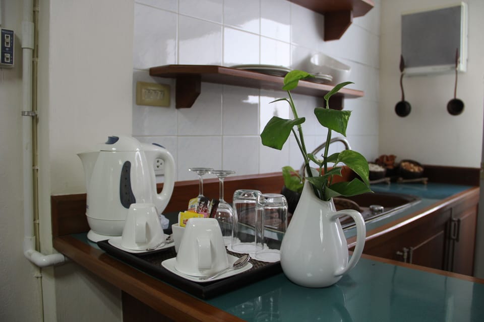 Family Room | Private kitchen | Fridge, microwave, coffee/tea maker, electric kettle