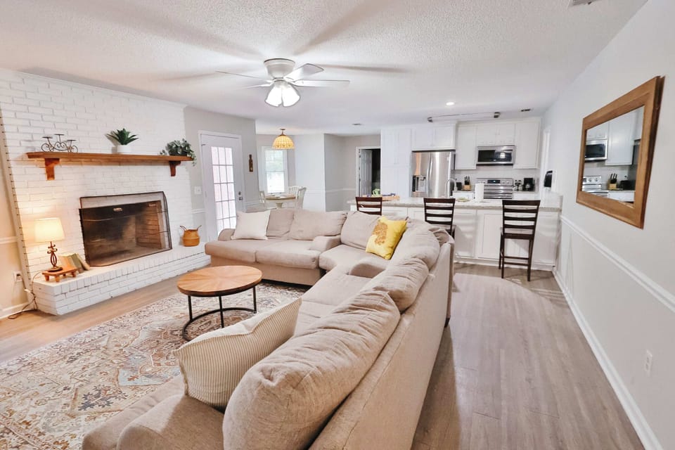 Living room with a gloriously comfortable couch for all of the R&R needs!