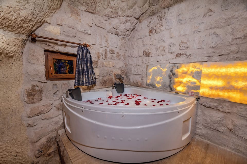 Business Suite | Bathroom | Designer toiletries, hair dryer, bathrobes, slippers