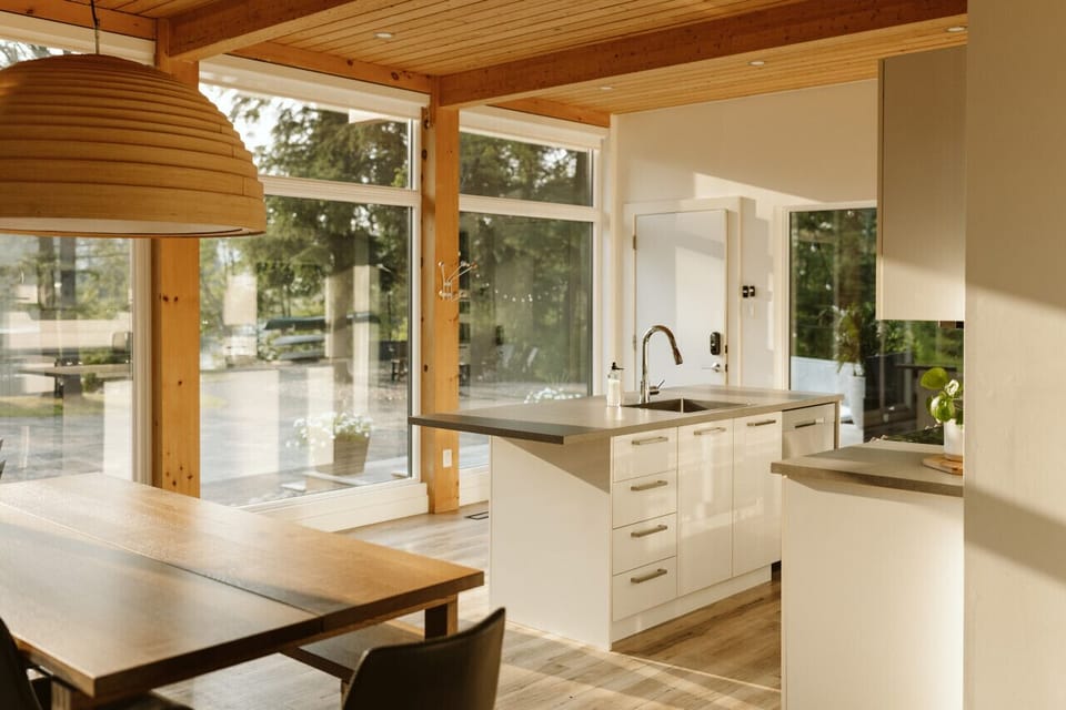 The floor to ceiling windows bring the beauty of the outdoors inside