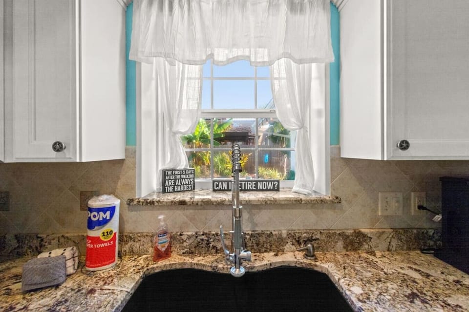 Kitchen has views of the pool
