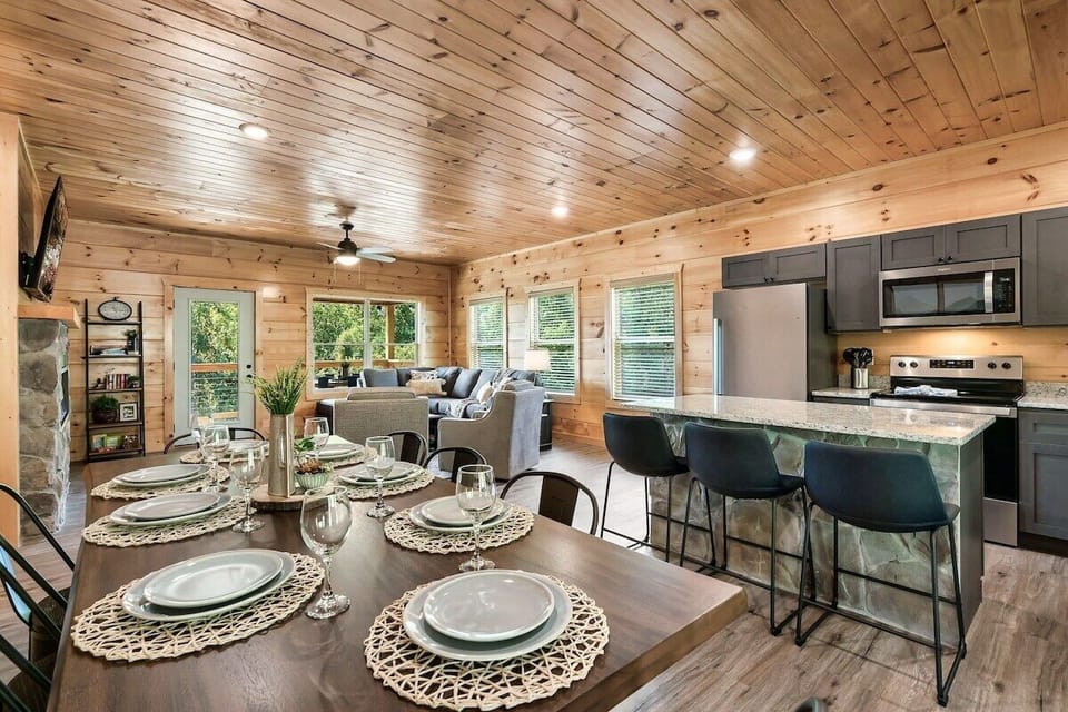 Plenty of space at the dinner table for 8, plus barstools at the island, or head to the dinner table o nthe deck. Barstools at the island also provide additional seating.