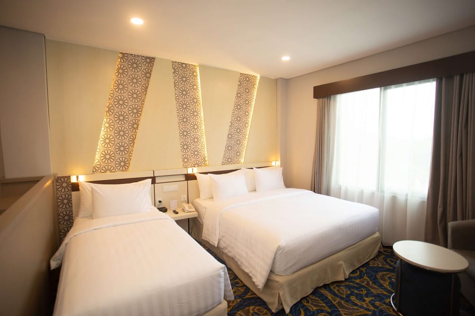 Hypo-allergenic bedding available, in-room safe, desk, laptop workspace