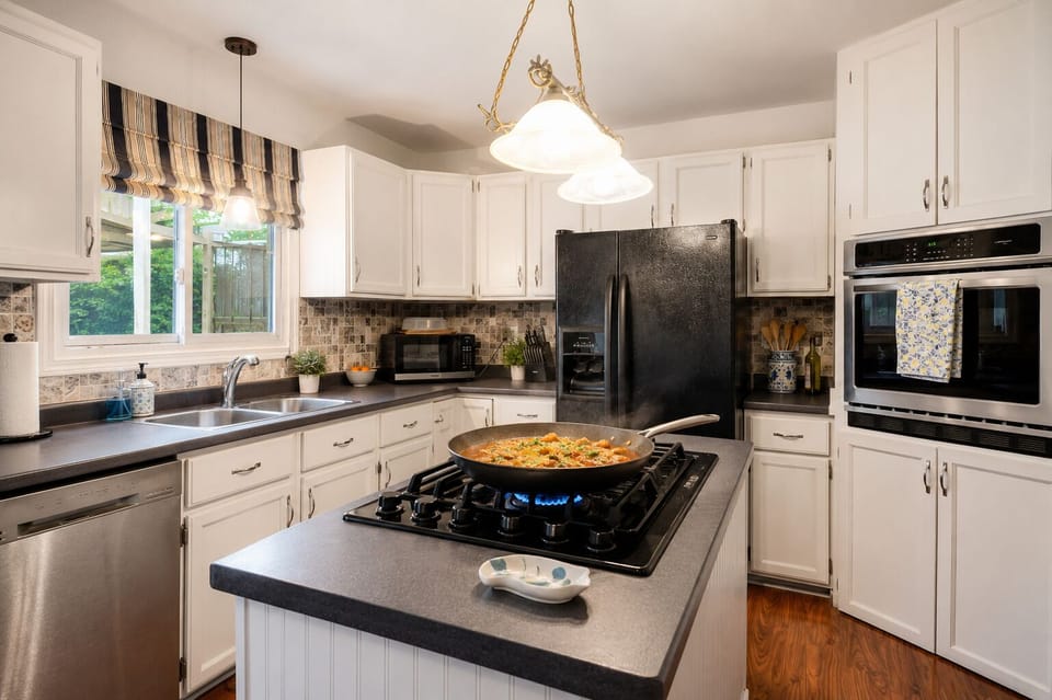 Fully equipped kitchen with everything needed for weekend getaways or longer stays.