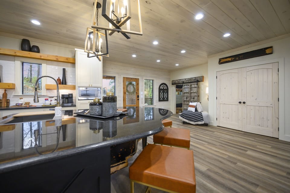You’ll love the cushioned barstool seating at the piano island. Grab a snack or breakfast.