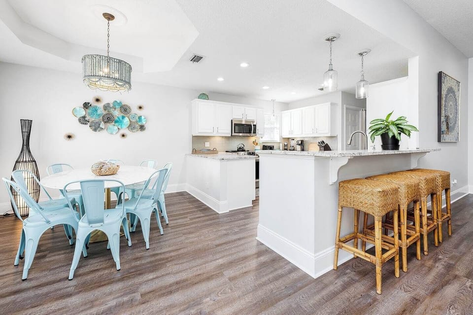 The dining area has dining table and breakfast bar seat where you can enjoy your meal!
