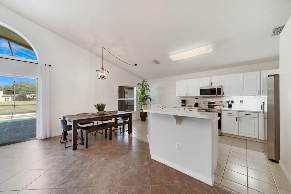 Gather with family | Elegant dining table | Open concept kitchen | Enjoy a meal