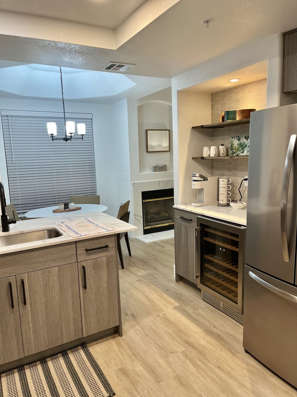 Quartz counters, ss appliances, and your own drink/wine fridge