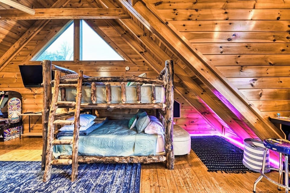 Queen size bunkbeds in the loft + a kids corner for super secret meetings.