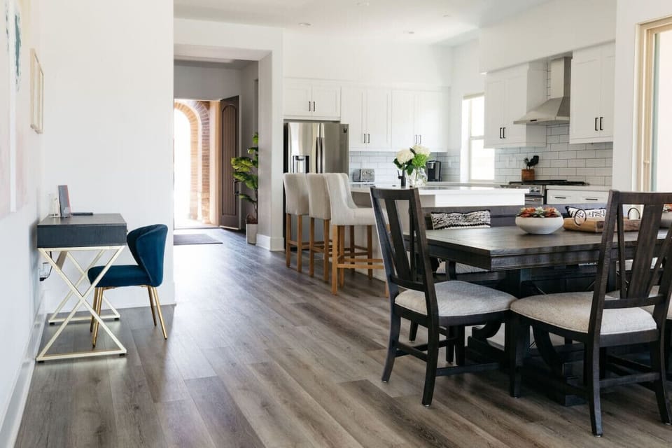 Open-concept dining & kitchen area w/ natural light & seamless flow