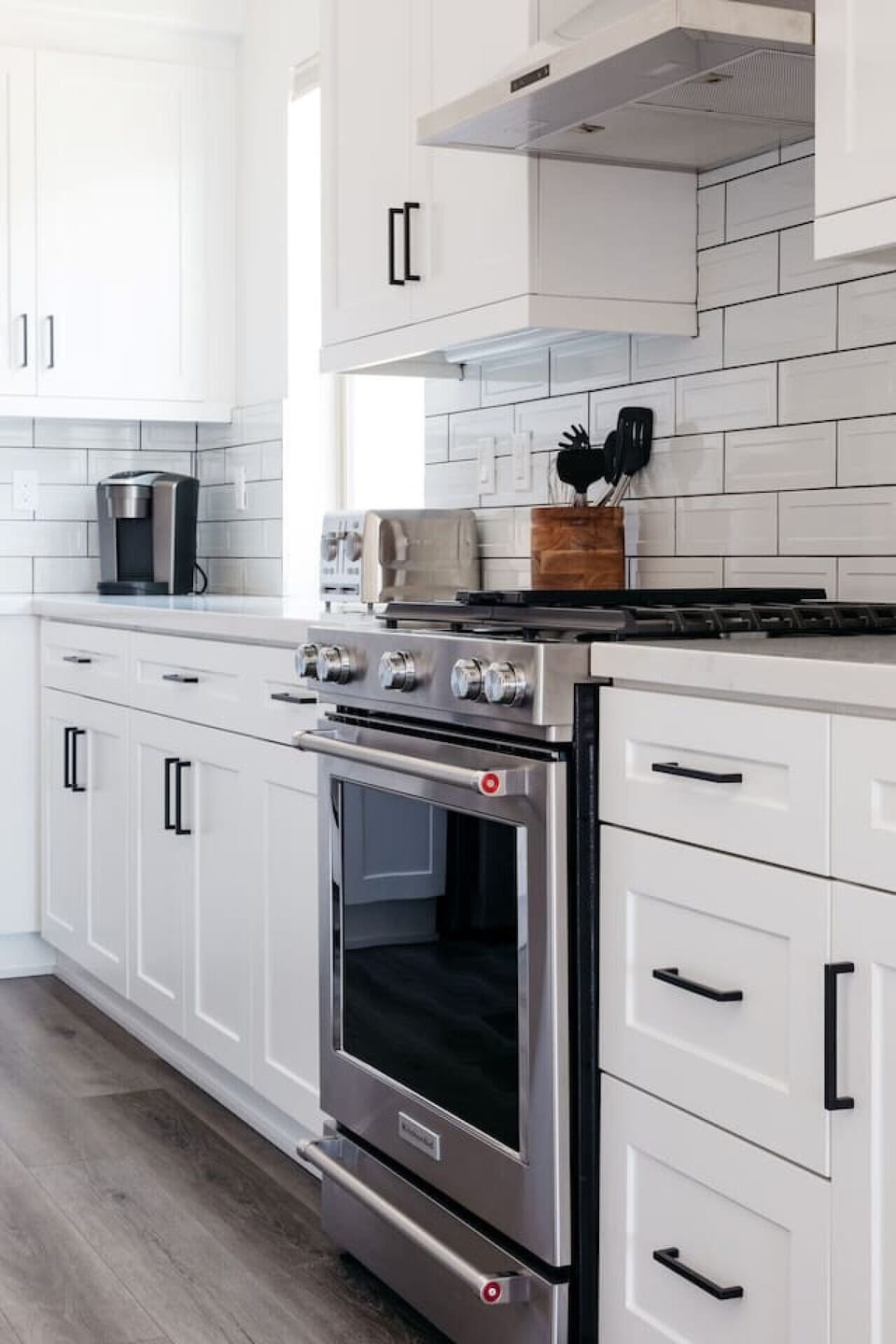 Close-up of gas range & counters, offering a stylish and functional cooking space