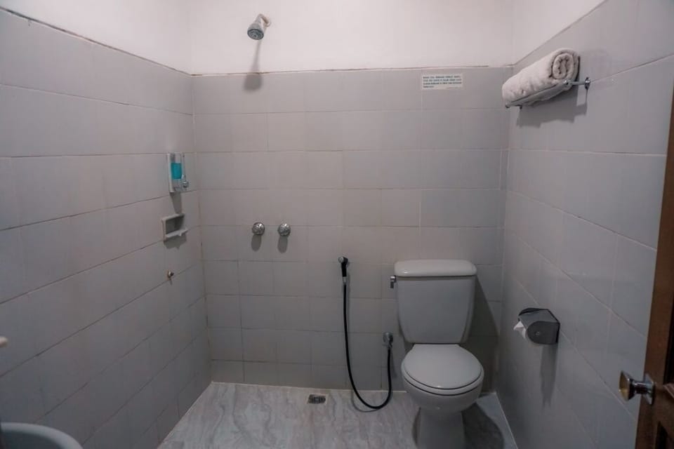 Shower, free toiletries, slippers, towels
