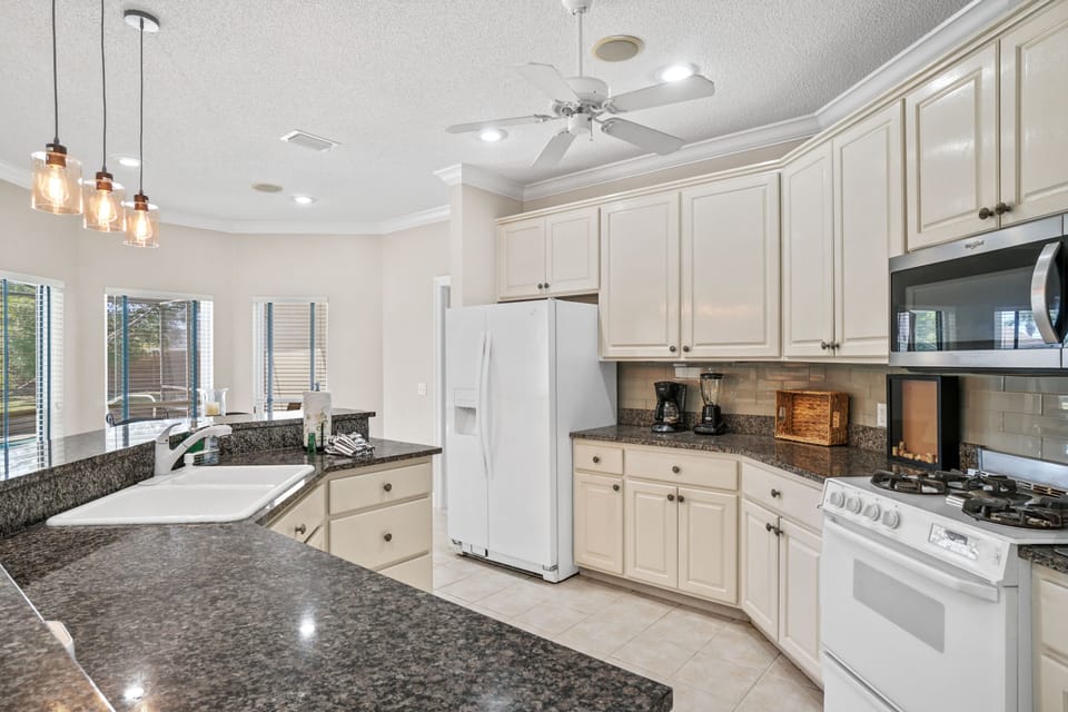 Large, open kitchen. Great for making memories and cooking family meals after a day at the beach or lounging around the pool.