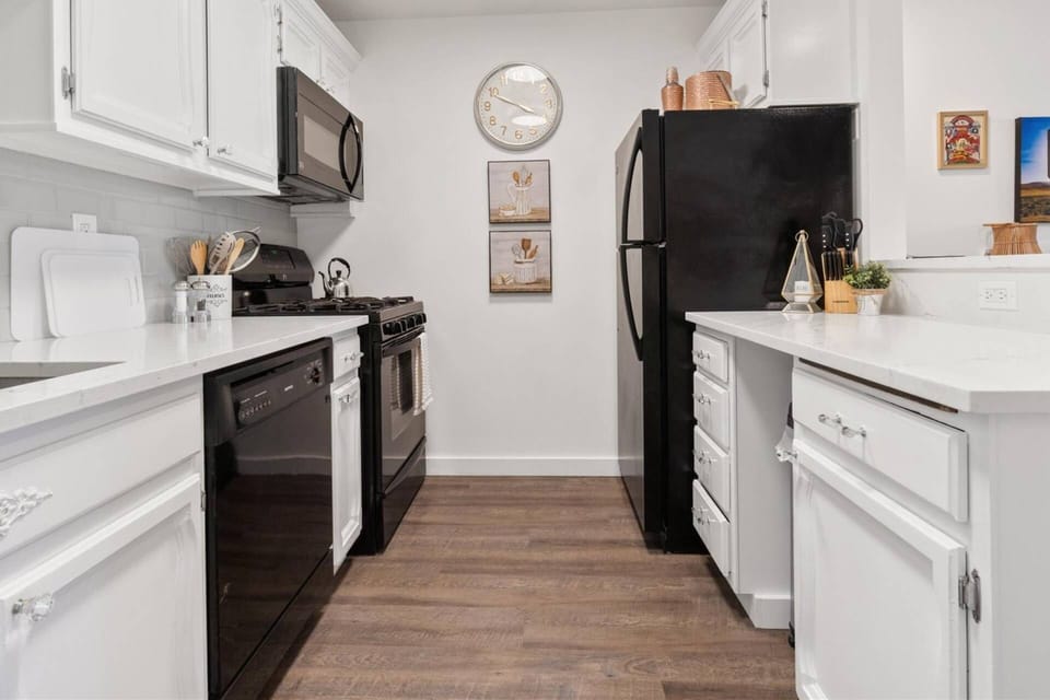 Fully-equipped kitchen with all necessary kitchen cooking utensils and dish-ware