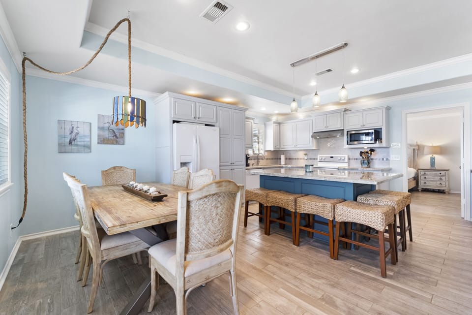 Kitchen is fully stocked and includes a coffee maker, crockpot, and toaster. 