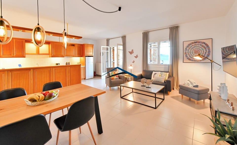 The living room, dining area and kitchen