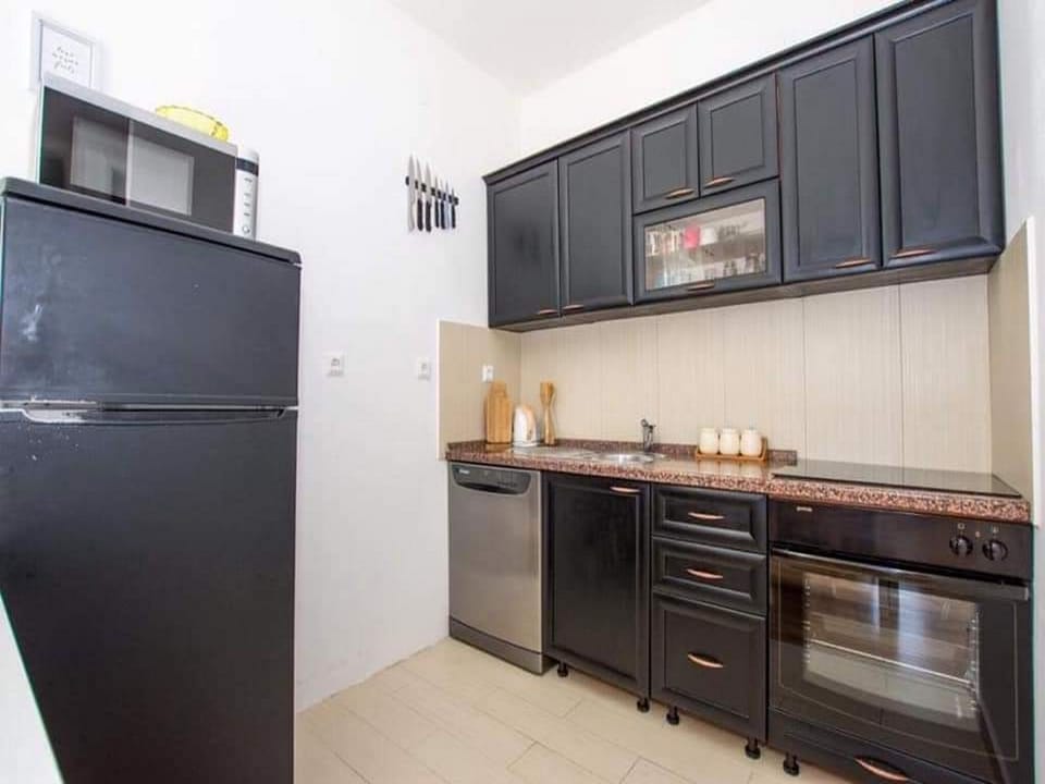 Apartment (One Bedroom Apartment with Balcony an) | Private kitchen | Fridge