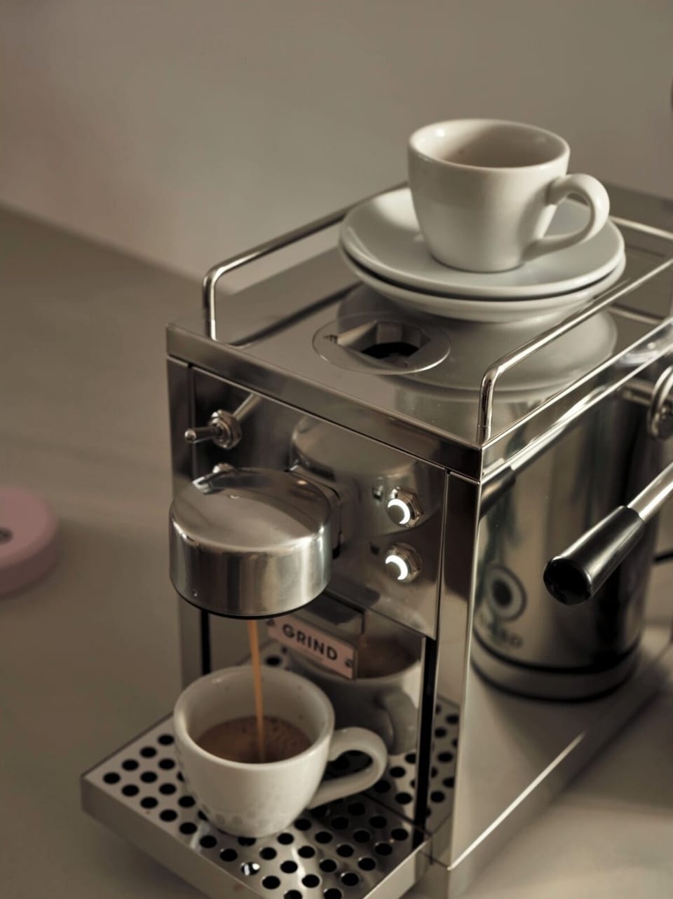 Enjoy a morning coffee with the Grind coffee maker.
