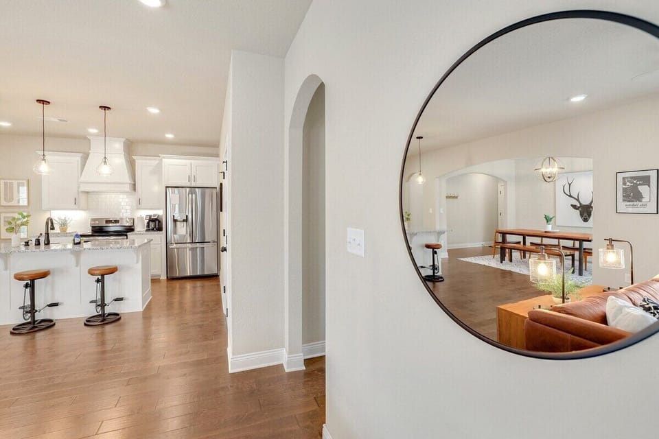 Head directly to the right of the living room and you'll enter our kitchen.