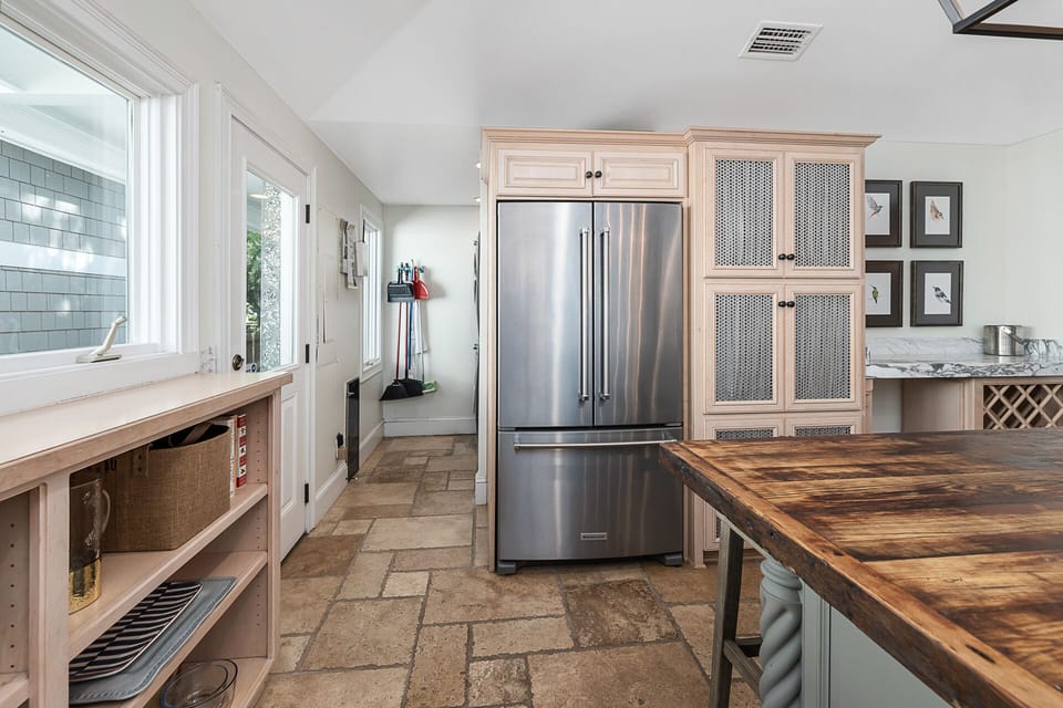 Kitchen leading to laundry area