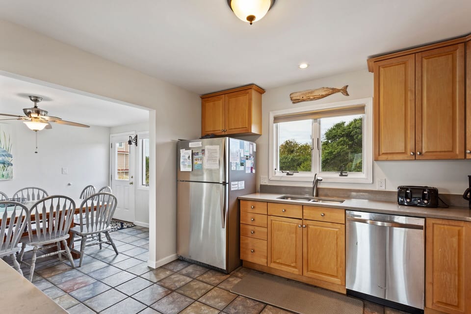Whip up something delicious in the main-level Kitchen with stainless steel appliances!