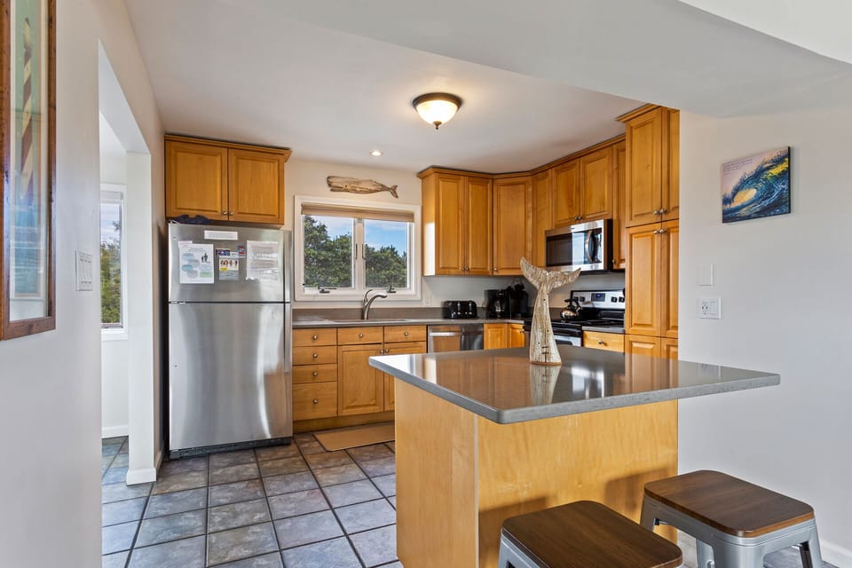 Whip up something delicious in the main-level Kitchen with stainless steel appliances!