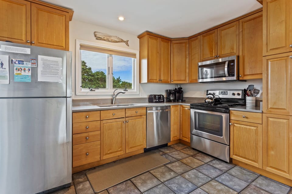 Whip up something delicious in the main-level Kitchen with stainless steel appliances!