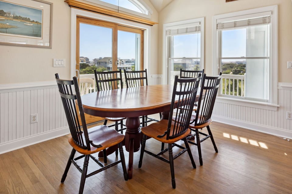 Each together at the Dining Table, which seats 10, or the Breakfast Bar, with 7 additional seats.