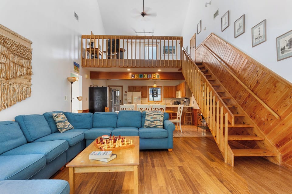 Relax in the open-air Living Area with Flat Screen TV for family movie night.