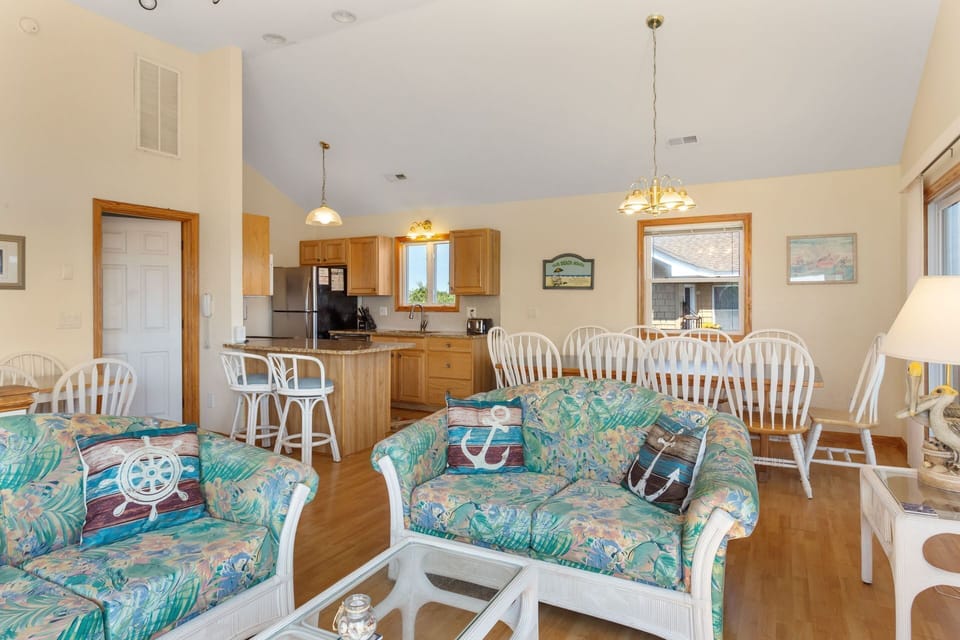 Relax in the spacious Top-Level Living Area with a large Flat Screen TV.