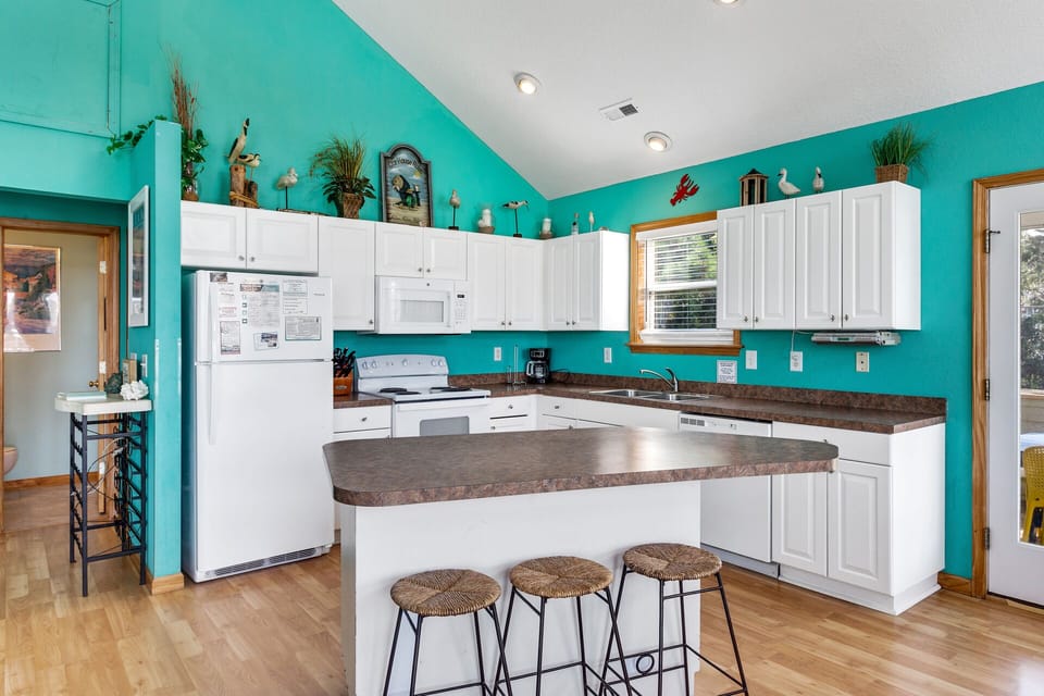 The Kitchen with modern amenities is perfect for whipping up a delicious meal that the whole family will enjoy.