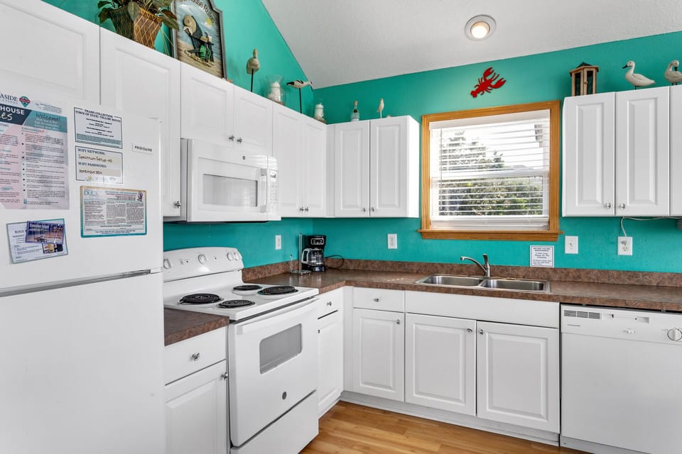 The Kitchen with modern amenities is perfect for whipping up a delicious meal that the whole family will enjoy.