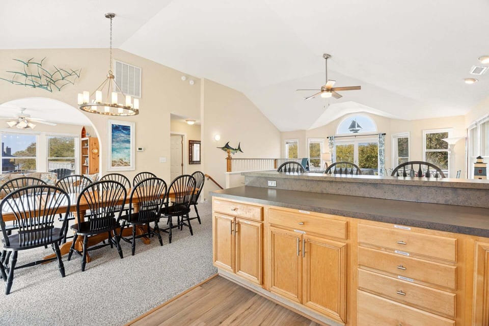 The dining area comfortably seats ten guests, making it ideal for shared meals and special occasions.