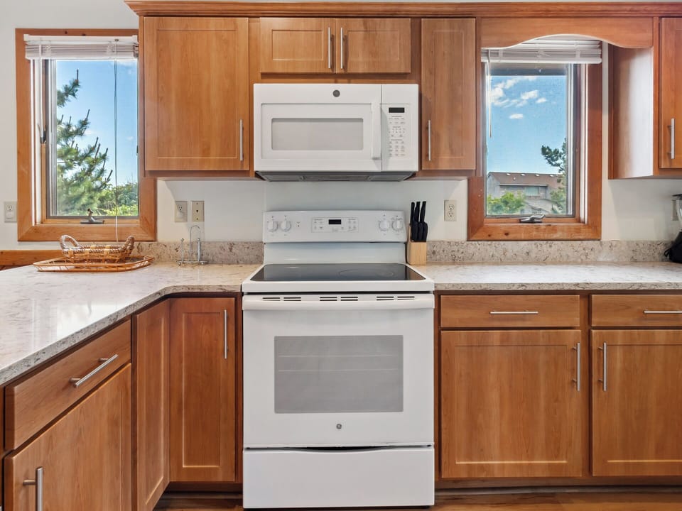 Whip up an impressive meal for the whole family in the spacious, modern Kitchen with new Stainless Steel appliances.