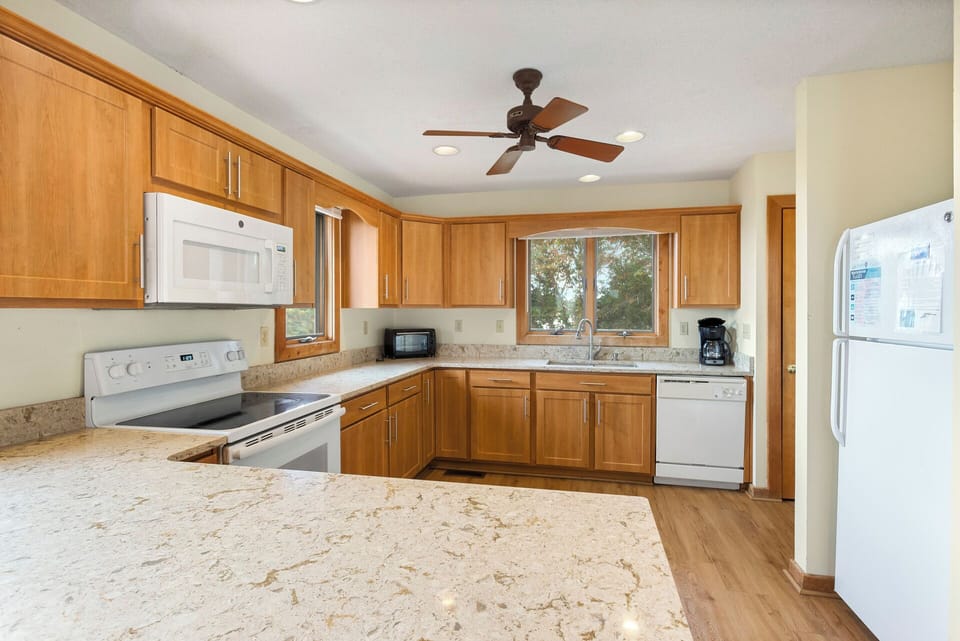 Whip up an impressive meal for the whole family in the spacious, modern Kitchen with new Stainless Steel appliances.