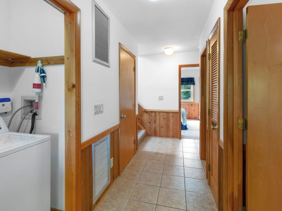 The Laundry Area is easily accessible in the Middle Level Hallway.