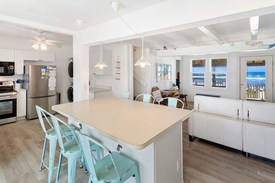 The Open-Concept Kitchen and Living Area keeps your loved ones close.
