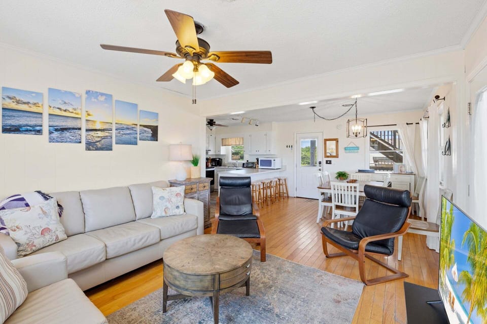 Unwind after a day at the beach in the Living Area with a Flat Screen TV!