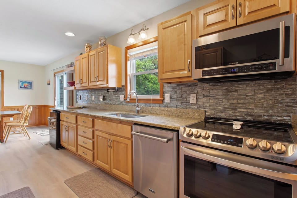 Whip up something delicious in the Kitchen with modern appliances and plenty of prep space.