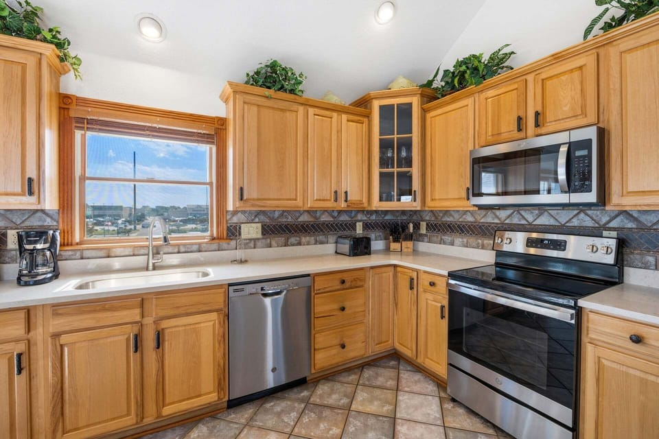 Whip up something delicious in the Top-Level Kitchen with modern appliances and lots of prep space!