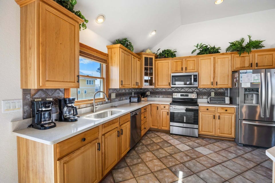 Whip up something delicious in the Top-Level Kitchen with modern appliances and lots of prep space!